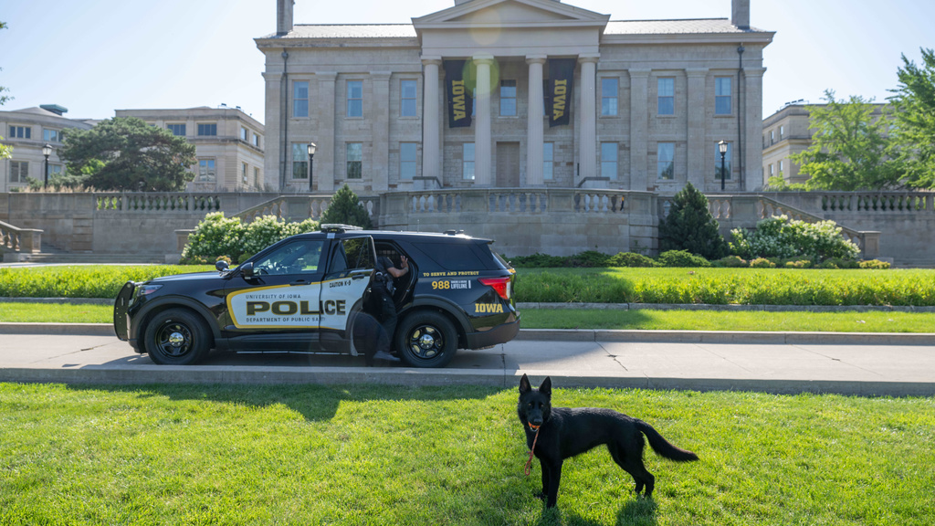 Police car and K9 dog in front of the Old Capital 