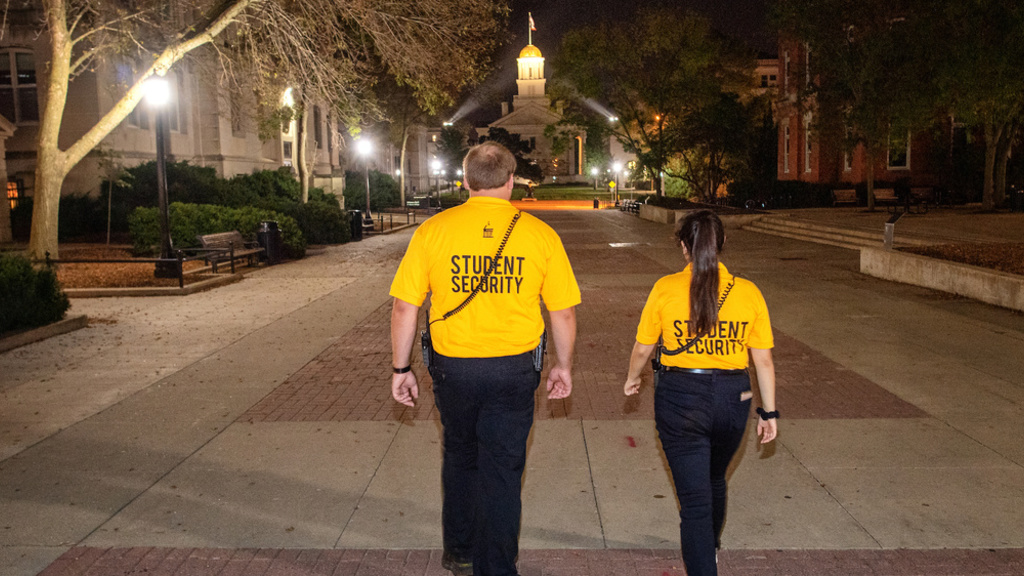 Two campus security workers walking around campus 