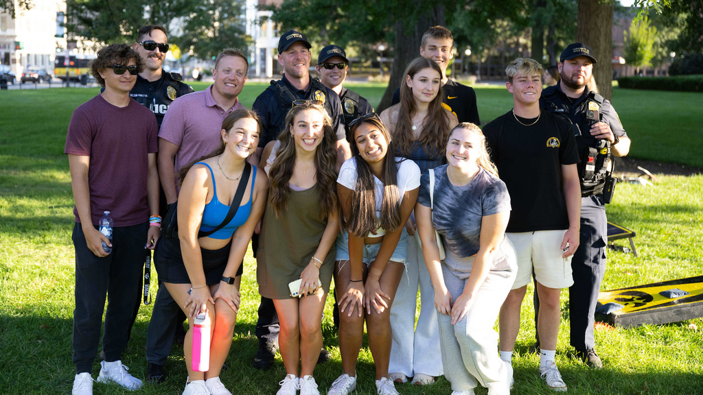A group of students with campus security